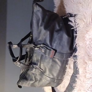 TUMI  leather travel bag